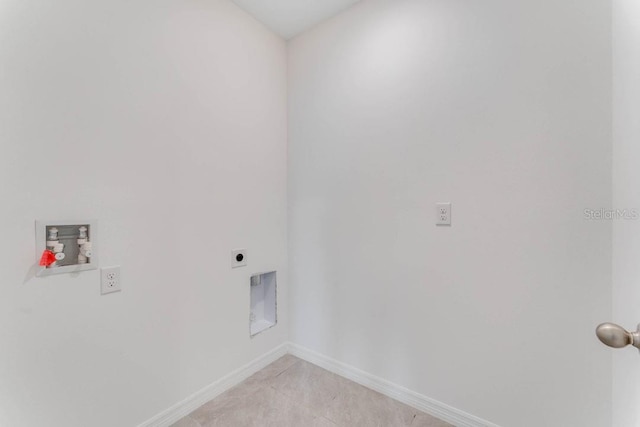 clothes washing area featuring hookup for an electric dryer and hookup for a washing machine