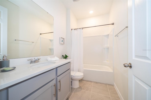 full bathroom featuring vanity, tile patterned floors, toilet, and shower / tub combo