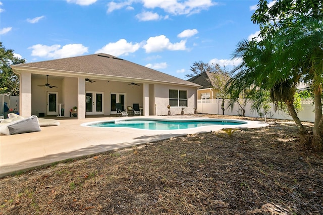 view of pool with a patio area and ceiling fan