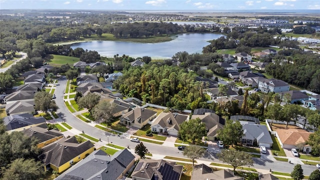 bird's eye view with a water view