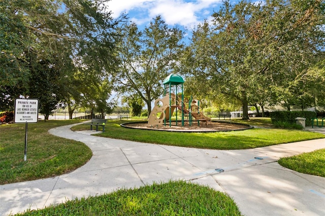 view of play area with a yard