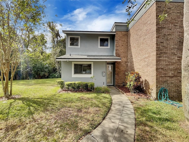 view of front of house with a front lawn