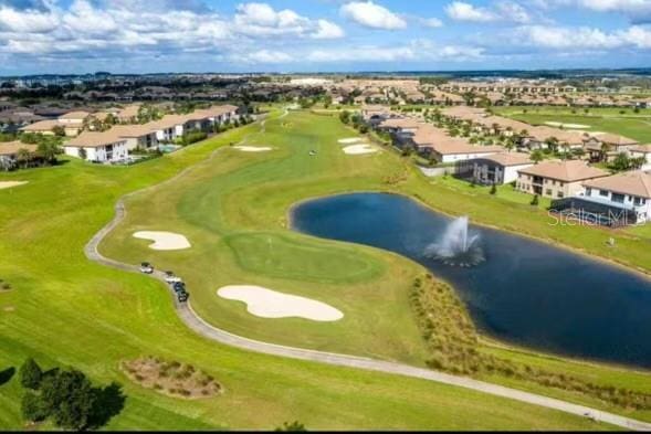 1144 Challenge Dr, Davenport, FL 33896 - aerial perspective of suburban area featuring a nearby body of water and a golf course