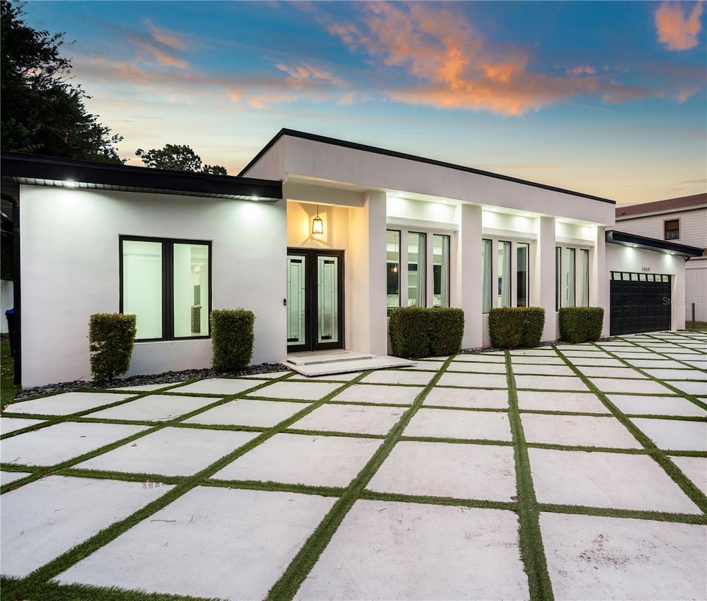 view of front of property with a garage