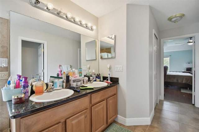 bathroom featuring vanity, ceiling fan, and tile patterned floors