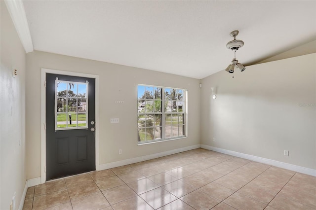 1053 E Hancock Dr, Deltona, FL 32725 - foyer featuring vaulted ceiling and light tile patterned floors
