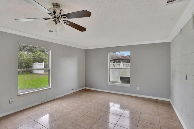 1053 E Hancock Dr, Deltona, FL 32725 - tiled spare room with ceiling fan, crown molding, and a textured ceiling