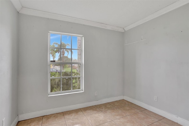 1053 E Hancock Dr, Deltona, FL 32725 - spare room with crown molding and light tile patterned floors