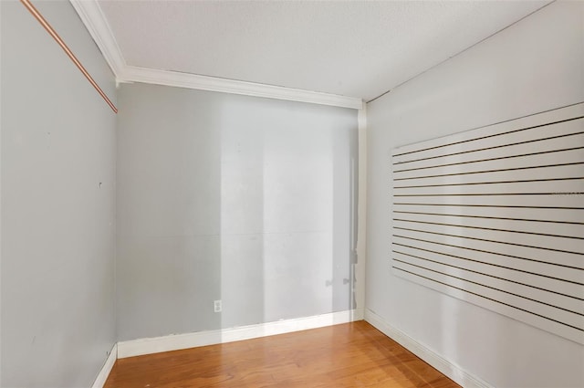 1053 E Hancock Dr, Deltona, FL 32725 - unfurnished room with crown molding and wood finished floors