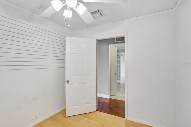 1053 E Hancock Dr, Deltona, FL 32725 - unfurnished bedroom with light wood finished floors and baseboards