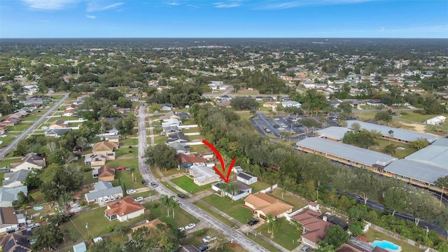 1053 E Hancock Dr, Deltona, FL 32725 - aerial view of property and surrounding area with nearby suburban area