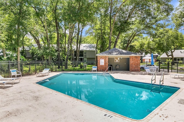 view of pool featuring a patio area