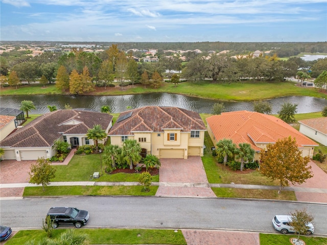 bird's eye view with a water view