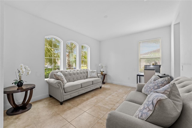 living room with light tile patterned flooring