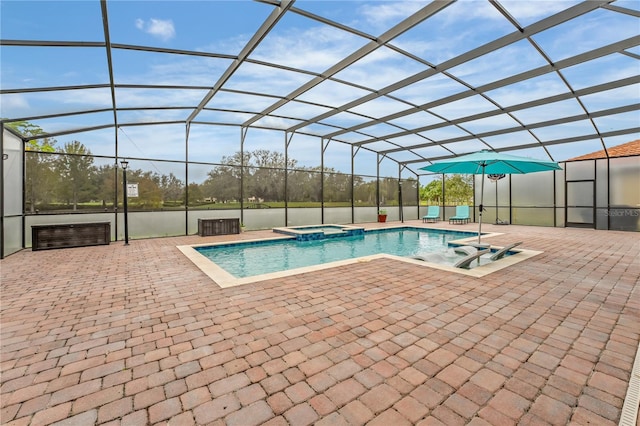 view of swimming pool featuring a patio area, glass enclosure, and an in ground hot tub