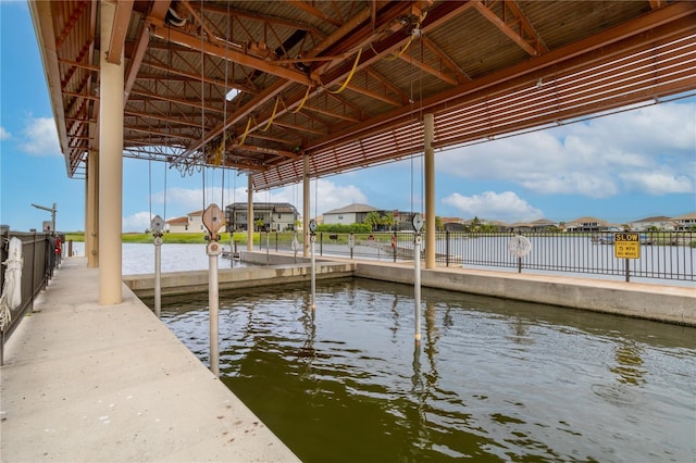 dock area with a water view