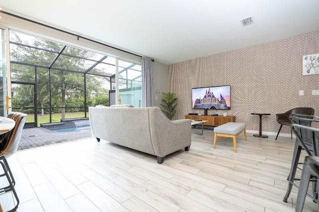 living room with light hardwood / wood-style floors