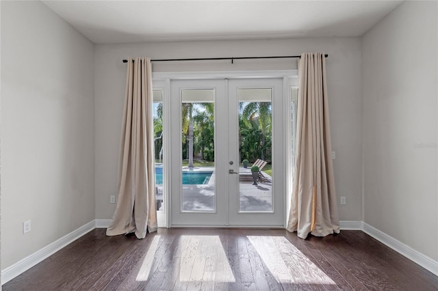 entryway featuring french doors and dark hardwood / wood-style floors