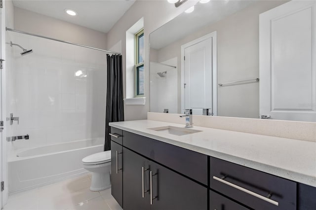 full bathroom featuring tile patterned flooring, vanity, toilet, and shower / bath combo with shower curtain