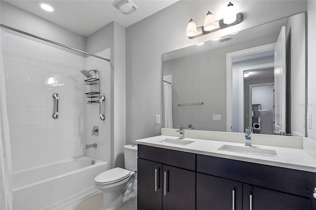 full bathroom featuring shower / tub combo, vanity, and toilet