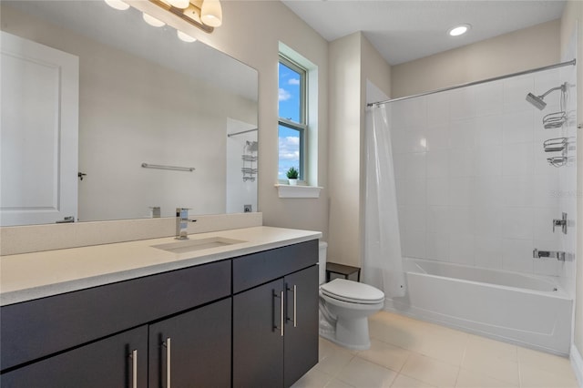 full bathroom featuring tile patterned flooring, shower / bath combo, vanity, and toilet