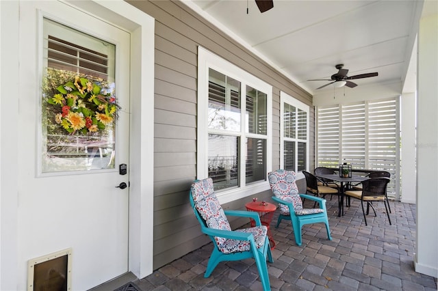 view of patio with ceiling fan and covered porch