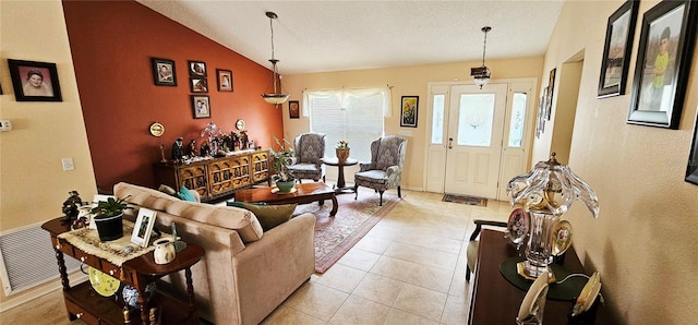 tiled living room with lofted ceiling