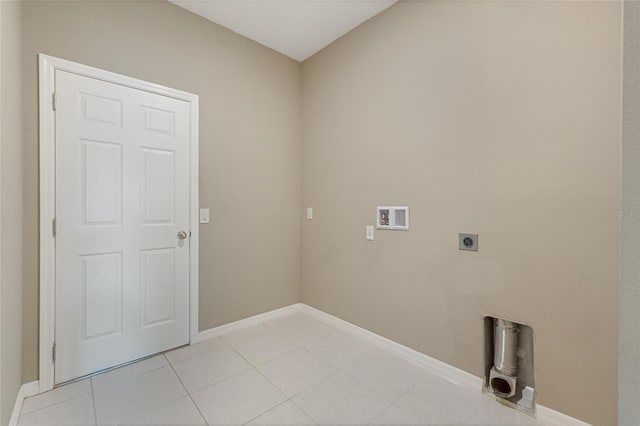 laundry room with hookup for an electric dryer, hookup for a washing machine, and light tile patterned floors