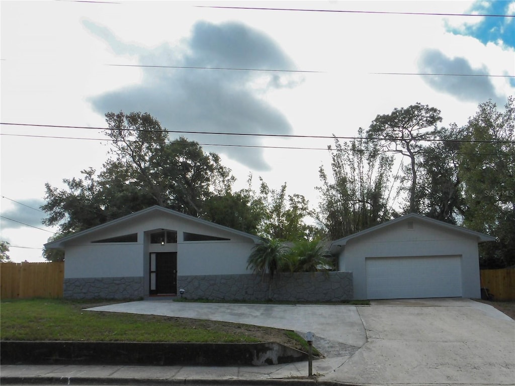 ranch-style house with a front yard