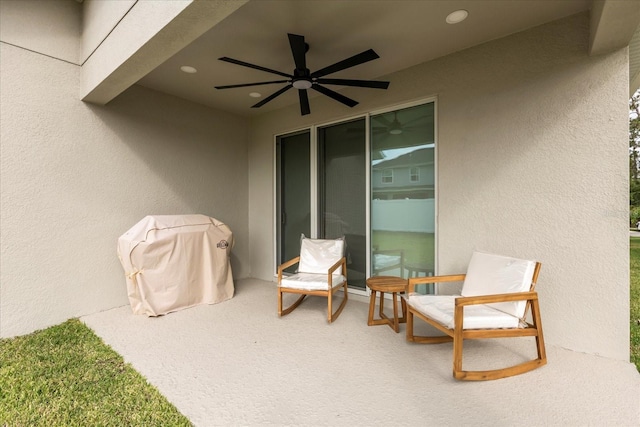 view of patio / terrace featuring ceiling fan