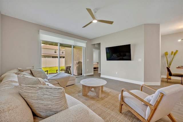 1554 Outback Rd W, Saint Cloud, FL 34771 - living room with a ceiling fan and wood finished floors