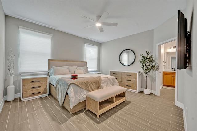 1554 Outback Rd W, Saint Cloud, FL 34771 - bedroom with light wood-type flooring, connected bathroom, and ceiling fan