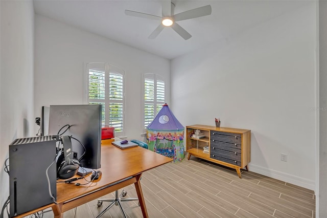 1554 Outback Rd W, Saint Cloud, FL 34771 - office featuring a ceiling fan and wood finished floors
