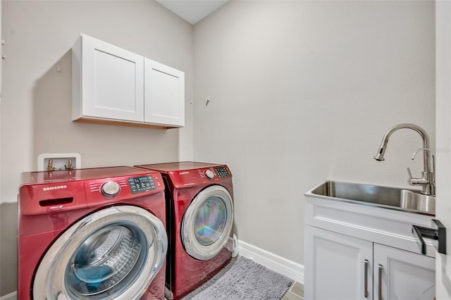 1554 Outback Rd W, Saint Cloud, FL 34771 - washroom with cabinet space and washer and clothes dryer