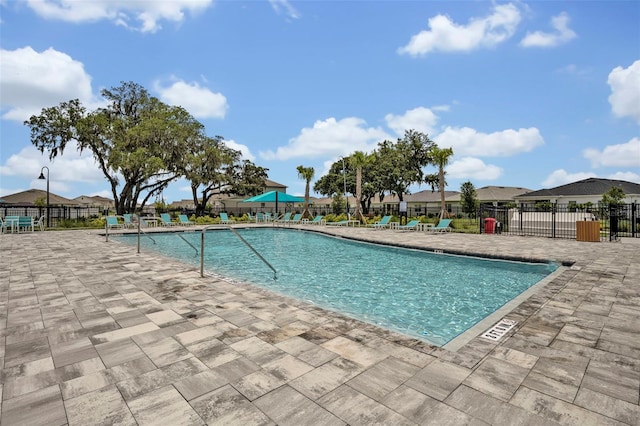 1554 Outback Rd W, Saint Cloud, FL 34771 - community pool with a patio area and a residential view