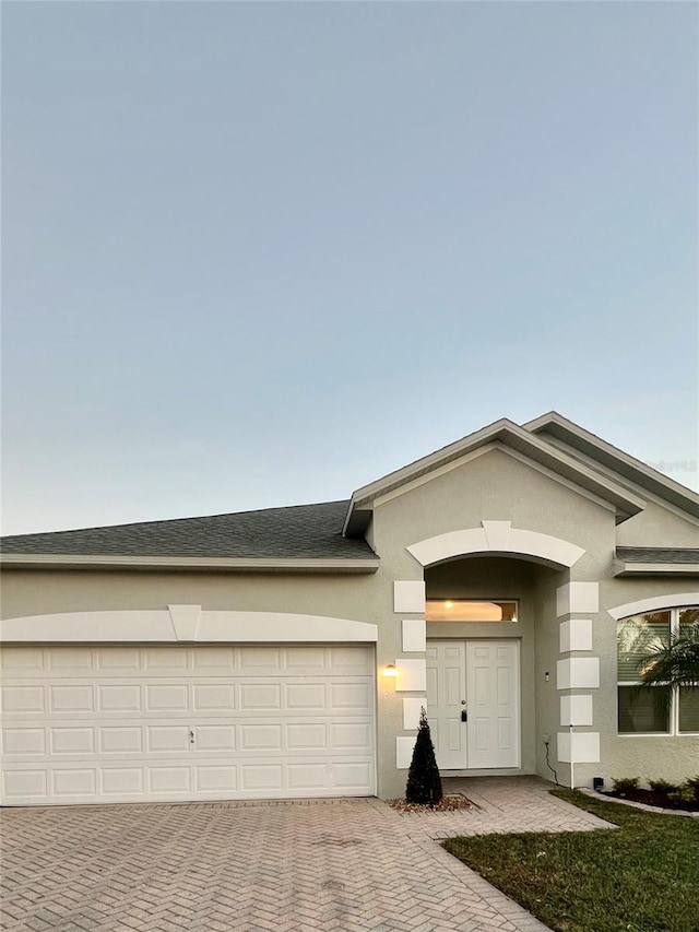 view of front of home featuring a garage