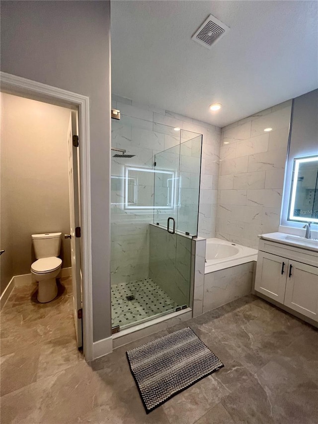 full bathroom featuring vanity, toilet, and shower with separate bathtub