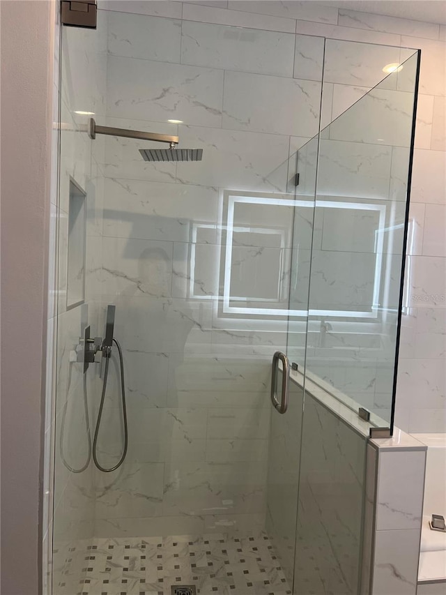 bathroom featuring walk in shower