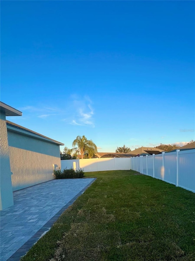 view of yard featuring a patio