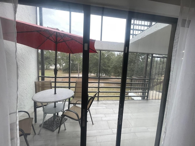 view of patio with a balcony