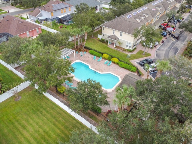 birds eye view of property with a residential view