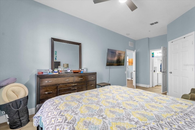 bedroom featuring light wood-type flooring and ceiling fan