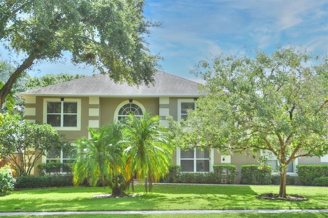 view of front of house with a front lawn