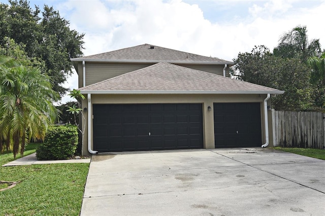 garage with a lawn