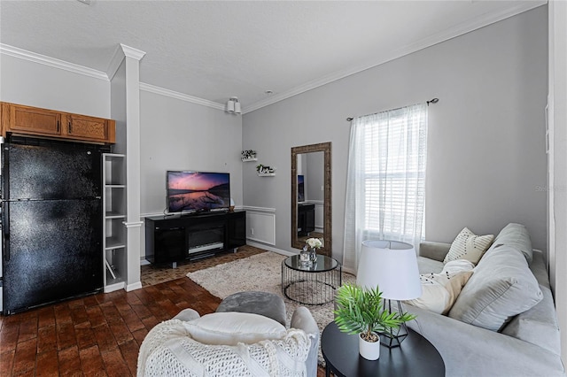 living room with dark wood-type flooring, a textured ceiling, and crown molding