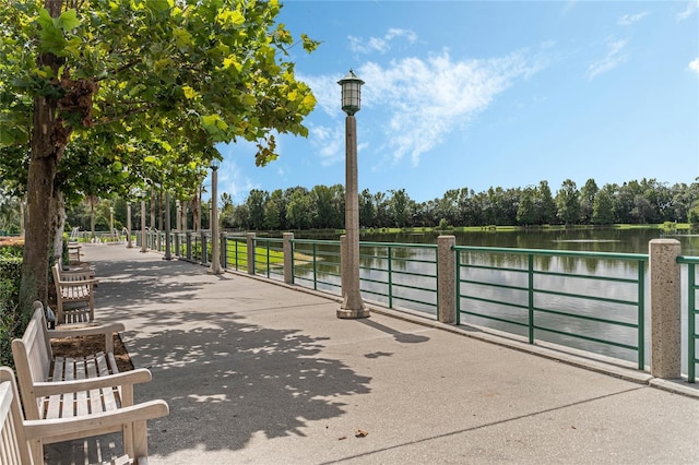 view of home's community with a water view