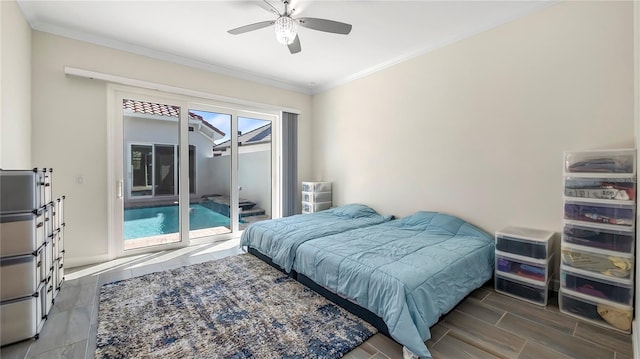 bedroom featuring wood-type flooring, crown molding, ceiling fan, and access to exterior