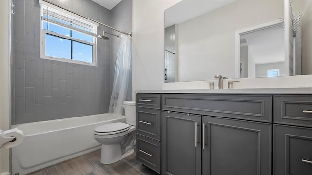 full bathroom with toilet, shower / bath combo, vanity, and wood-type flooring