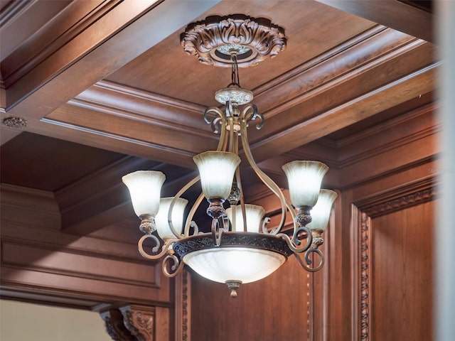 interior details with a notable chandelier and ornamental molding