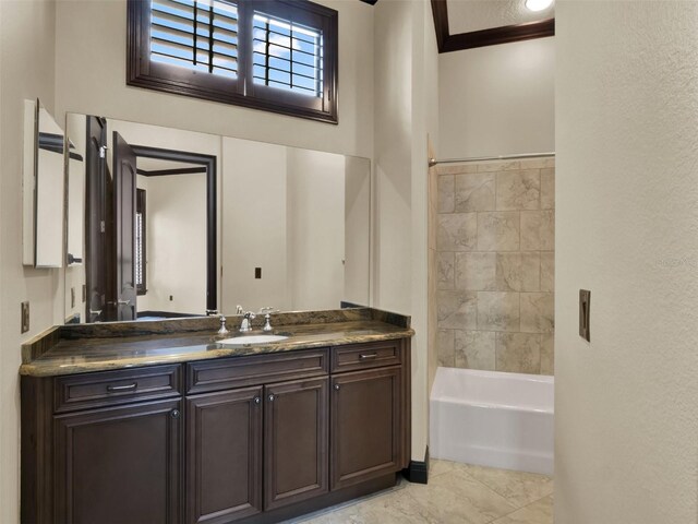 bathroom featuring shower / bath combination and vanity